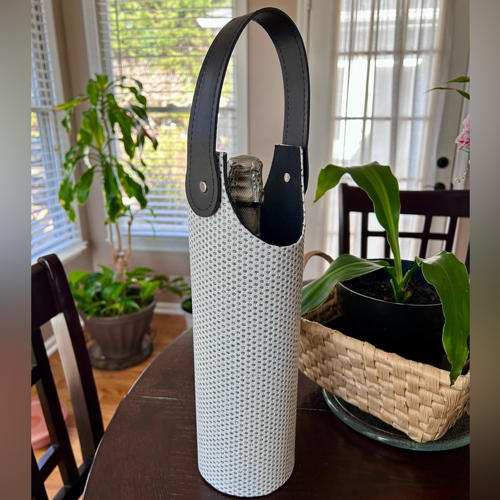Wine Bottle Carrier-Single. White container w/sparkle tones and Black handle